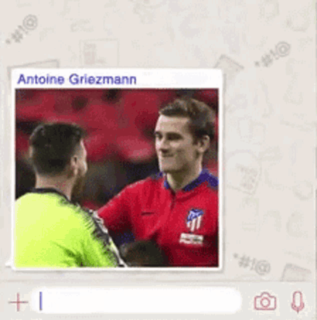 a picture of a soccer player named antoine griezmann on a phone screen