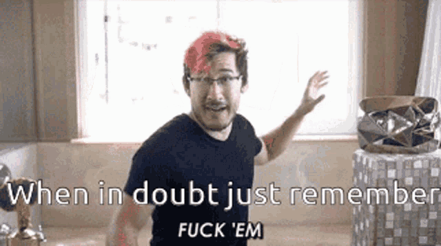 a man with red hair is standing in front of a window with the words " when in doubt just remember fuck em " on the bottom