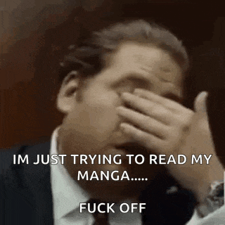 a man is covering his face with his hand and saying `` im just trying to read my manga ... fuck off ''