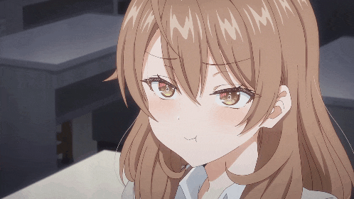 a close up of a girl 's face with the letters mm on her head