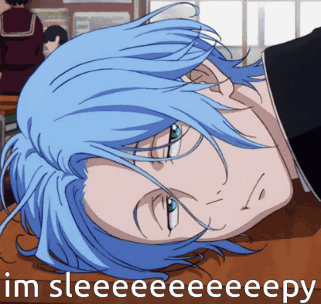 a blue haired anime character laying on a table with the words im sleeeeeeepy written below him