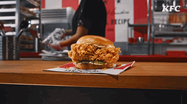 a fried chicken sandwich on a kfc advertisement