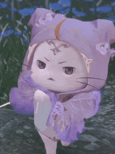 a cat wearing a purple hat and a blue dress