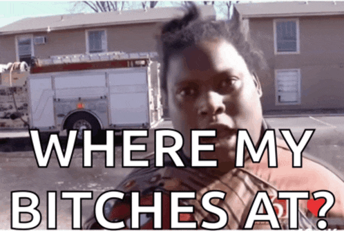 a woman is standing in front of a fire truck with the words where my bitches at
