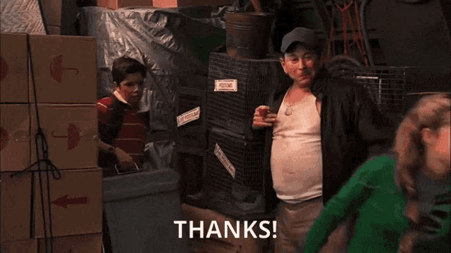 a man holding a cooler with the words thanks written on it
