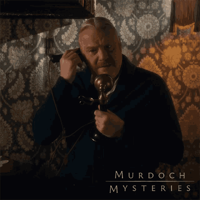 murdoch mysteries poster showing an old man talking on a phone