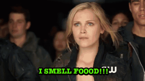 a woman in a crowd says " i smell food !!! "