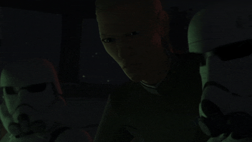 a group of stormtroopers are standing next to each other in the dark