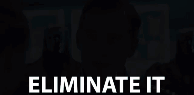 a man is talking to a woman and the words eliminate it are on the screen behind him