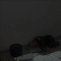 a person laying on the floor in front of a wall
