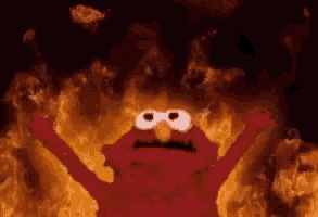 elmo from sesame street is on fire with his arms outstretched and his eyes closed .