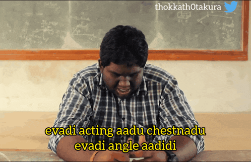 a man in a plaid shirt sits at a desk with a caption that says evadi acting
