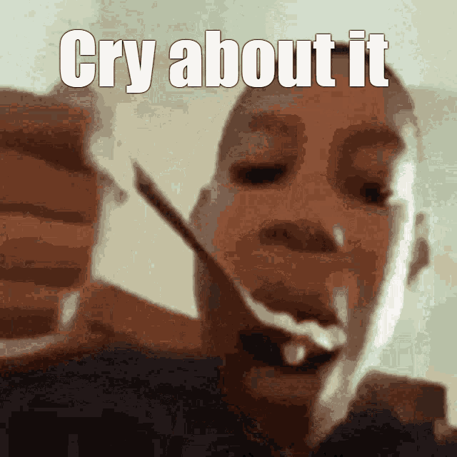 a man holding a spoon in his mouth with the words cry about it written above him