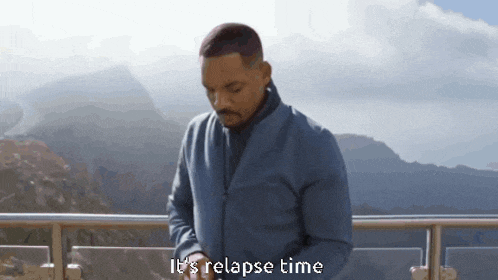 a man standing on a balcony with the words it 's relapse time written on the bottom
