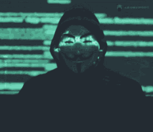 a man wearing a hooded jacket and a mask with a smile on his face