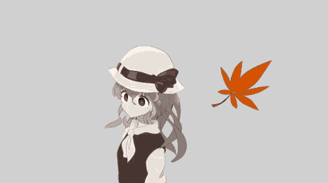 a girl wearing a hat with a bow on it