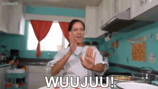 a woman in a hospital gown is saying wuu juu