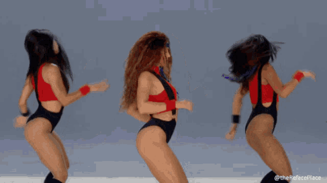 three women are dancing and one of them has a headband that says ' sds ' on it
