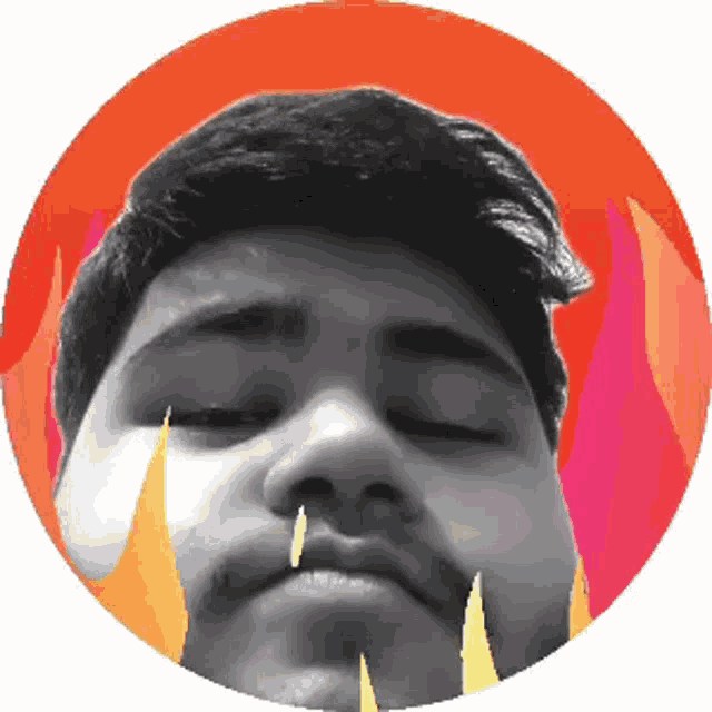 a close up of a man 's face in a circle with flames behind him