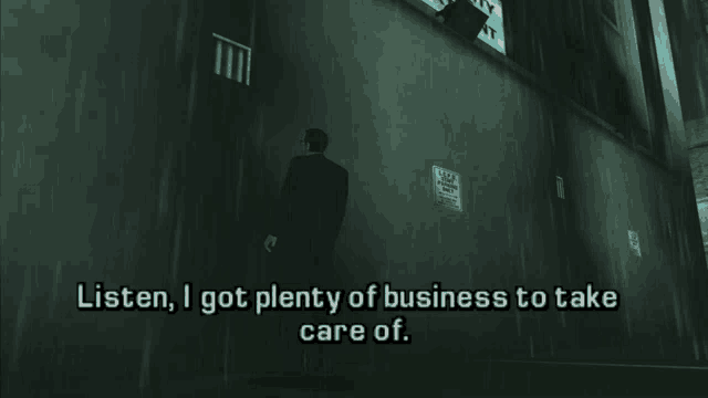 a man in a suit stands in front of a wall that says listen i got plenty of business to take care of ..