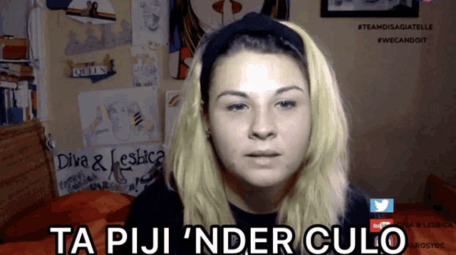 a woman says ta piji ' nder culo in a video