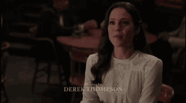 a woman in a white shirt is directed by peter delisle