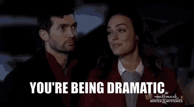 a man and woman are looking at each other with the words you 're being dramatic
