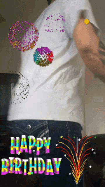 a man wearing a white shirt that says happy birthday on it