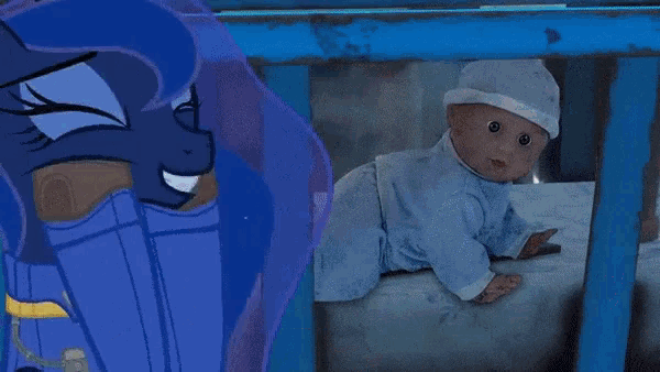 a baby is crawling through a fence next to a pony .