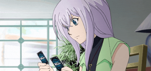 a girl with purple hair is holding two cards that say vanguard on them
