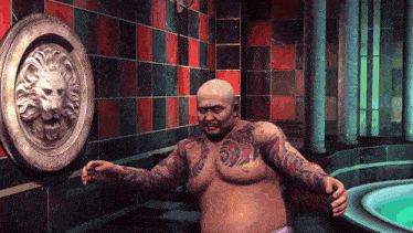 a man with a tattoo on his chest stands in front of a lion head