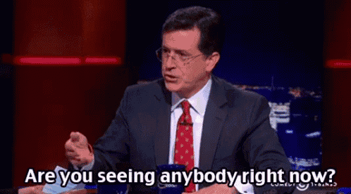 a man in a suit and tie says " are you seeing anybody right now ? "