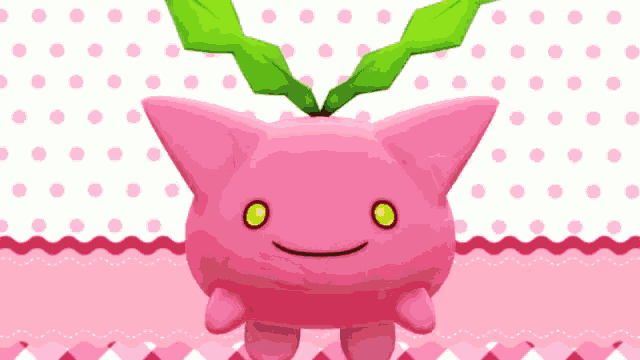 a pink cartoon character with green leaves on its head