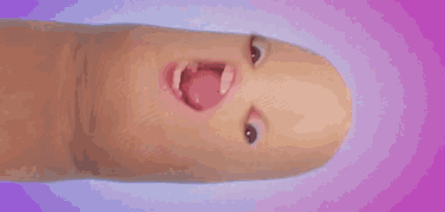 a person 's face is made out of a thumb on a purple background
