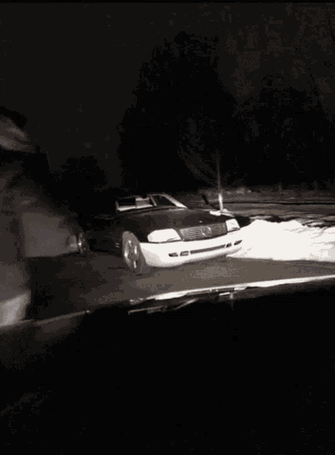 a white car with a license plate that says ' nc ' on it