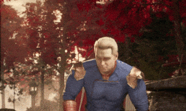 a man in a blue and gold superhero costume