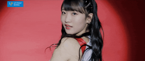 a girl with a red background and the words up front works