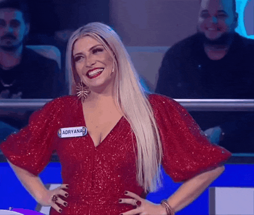 a woman in a red dress with a name tag that says adryanal