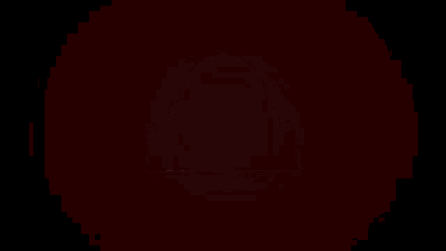 a silhouette of a person is lit up in red
