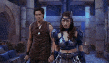 a group of warriors are fighting each other in a room .