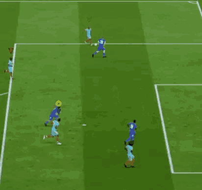 a group of soccer players are playing on a green field .