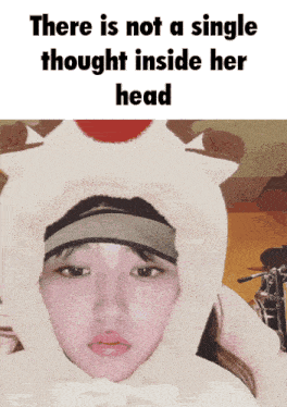 a picture of a woman with the words " there is not a single thought inside her head " above her