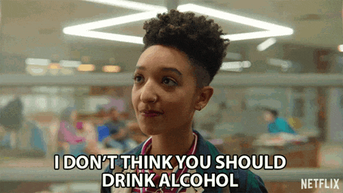 a woman is saying that she doesn 't think you should drink alcohol .