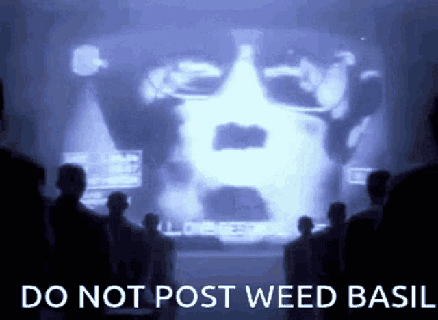 a group of people looking at a screen that says " do not post weed basil "