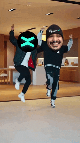 two men are jumping in the air with one wearing a hat that says blizzard x