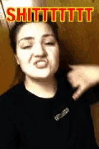 a woman is making a funny face and pointing at herself with the words shittttttt written above her