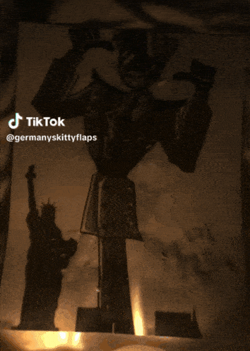 a drawing of a robot and the statue of liberty on a tiktok