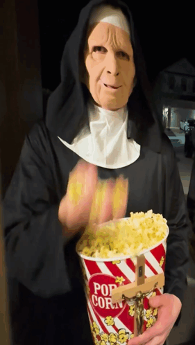 Nun Nuns GIF - Nun Nuns Popcorn GIFs