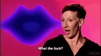 a woman is making a funny face in front of a purple mouth and says what the fuck .