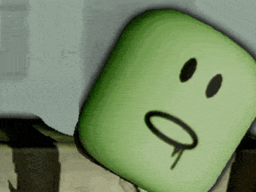 a green square with a smiley face and a tear coming out of it